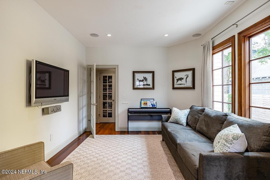 322 6th Street Atlantic Beach, FL 32233 - Photo 11 of 26 a living room with furniture and a window
