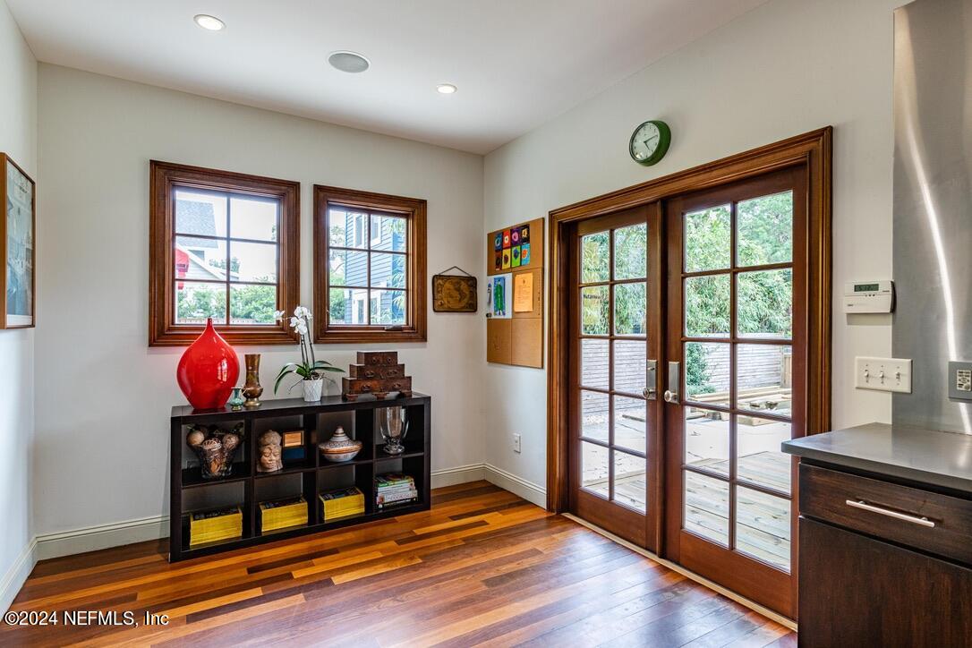 322 6th Street Atlantic Beach, FL 32233 - Photo 14 of 26 a very nice looking room with many windows and wooden floor
