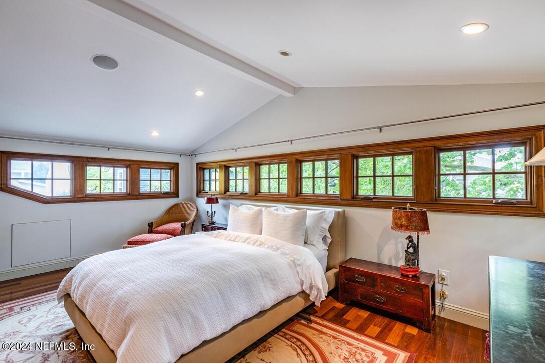 322 6th Street Atlantic Beach, FL 32233 - Photo 16 of 26 a bed room with a bed and a large window