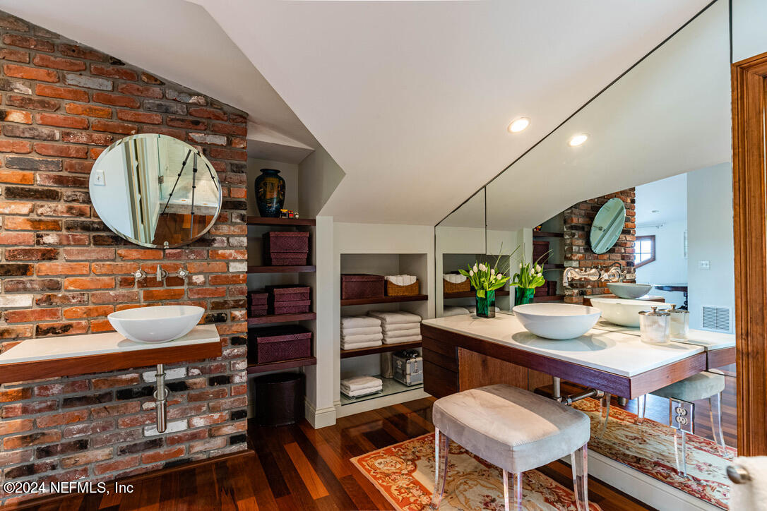 322 6th Street Atlantic Beach, FL 32233 - Photo 19 of 26 a room with stainless steel appliances kitchen island a table and chairs in it