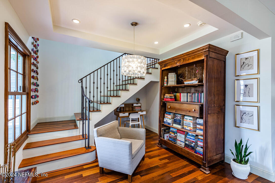 322 6th Street Atlantic Beach, FL 32233 - Photo 2 of 26 a living room with furniture and a book shelf