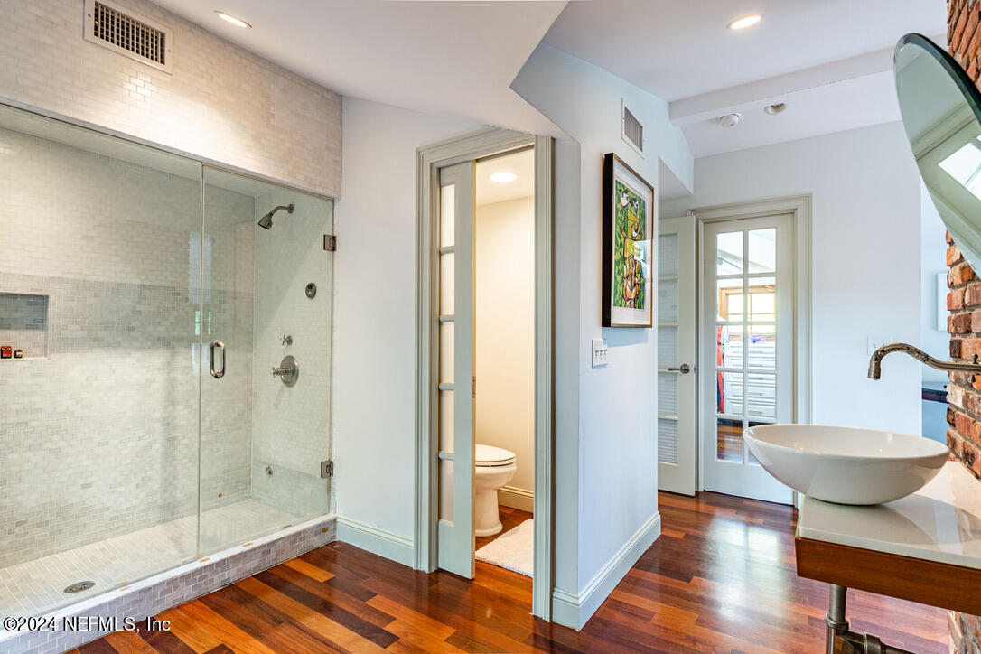 322 6th Street Atlantic Beach, FL 32233 - Photo 21 of 26 a bathroom with a tub and shower