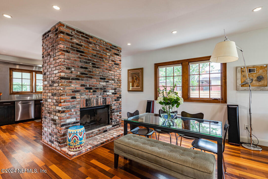 322 6th Street Atlantic Beach, FL 32233 - Photo 4 of 26 a living room with furniture a flat screen tv and a fireplace