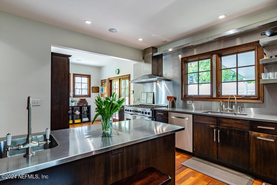 322 6th Street Atlantic Beach, FL 32233 - Photo 10 of 26 a kitchen with counter top space a sink and cabinets