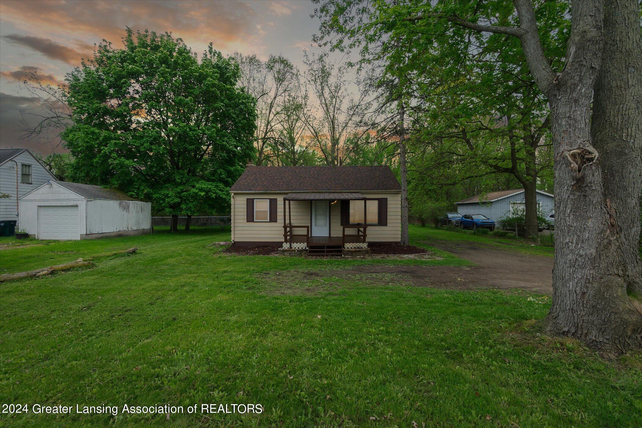 1821 West Jolly Road Lansing, MI 48910 - Photo 1 of 23 01-1821-W-Jolly-Rd-Lansing-MI-48910-Wind