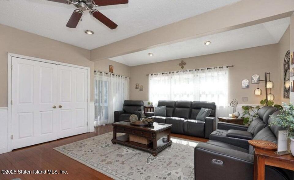 160 Rathbun Avenue Staten Island, NY 10312 - Photo 11 of 37 a living room with furniture and a window