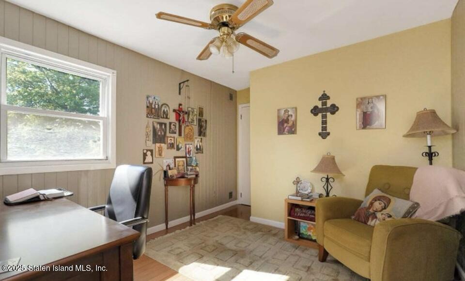 160 Rathbun Avenue Staten Island, NY 10312 - Photo 17 of 37 a living room with furniture and a window