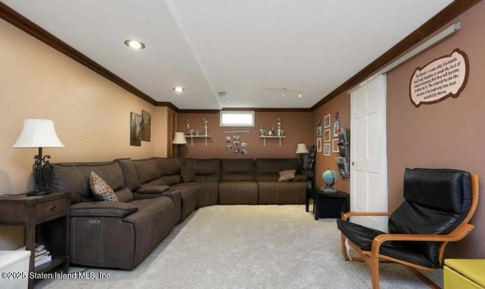160 Rathbun Avenue Staten Island, NY 10312 - Photo 20 of 37 a living room with furniture and a couch