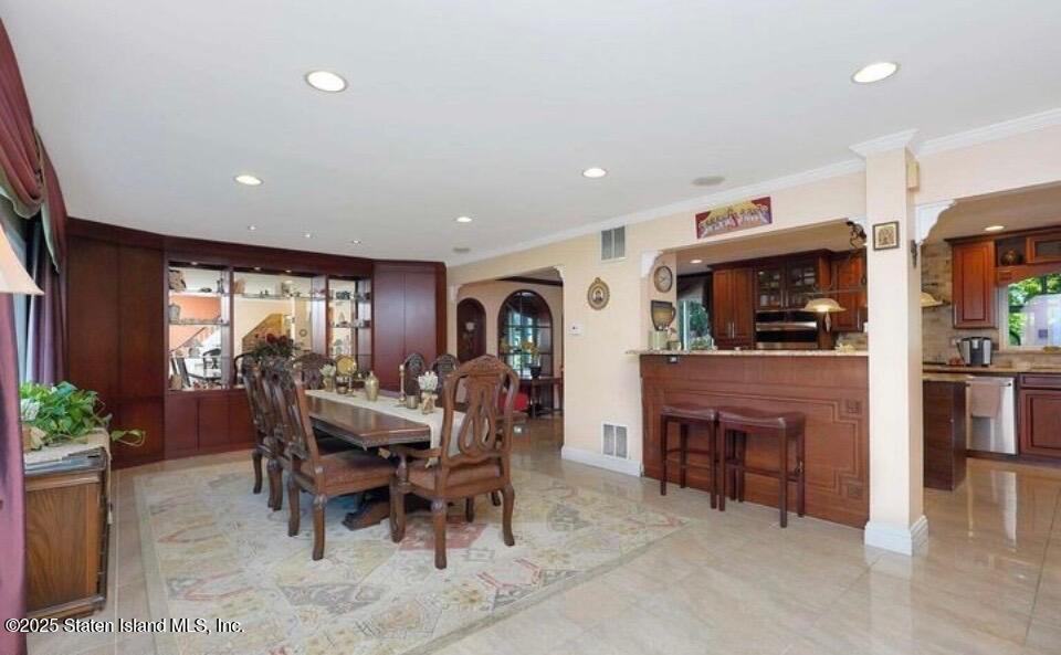160 Rathbun Avenue Staten Island, NY 10312 - Photo 4 of 37 a view of a livingroom with furniture window and a fireplace
