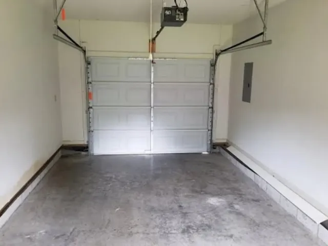 an empty room with shelves