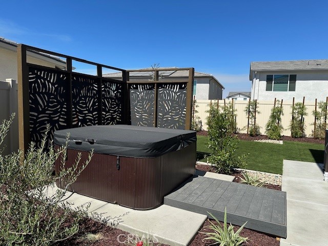 34294 Coconut Circle Winchester, CA 92596 - Photo 14 of 17 a view of a patio with couches table and chairs and potted plants