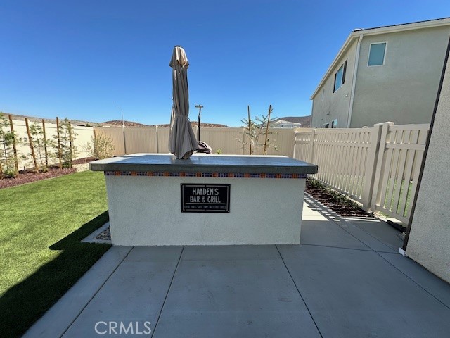 34294 Coconut Circle Winchester, CA 92596 - Photo 16 of 17 a view of a house with backyard
