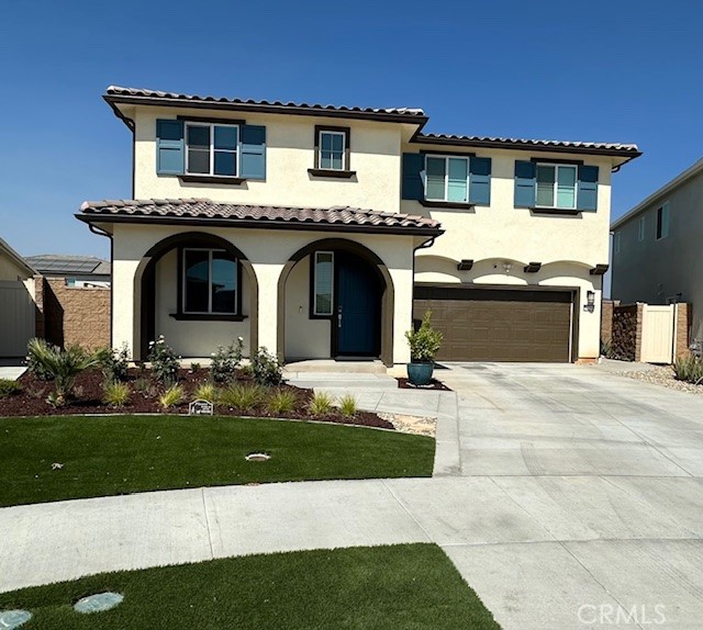 34294 Coconut Circle Winchester, CA 92596 - Photo 17 of 17 a front view of a house with garden