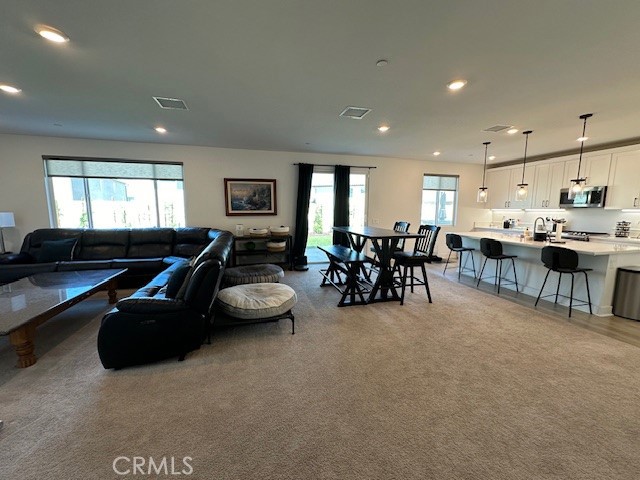 34294 Coconut Circle Winchester, CA 92596 - Photo 3 of 17 a living room with furniture and a large window
