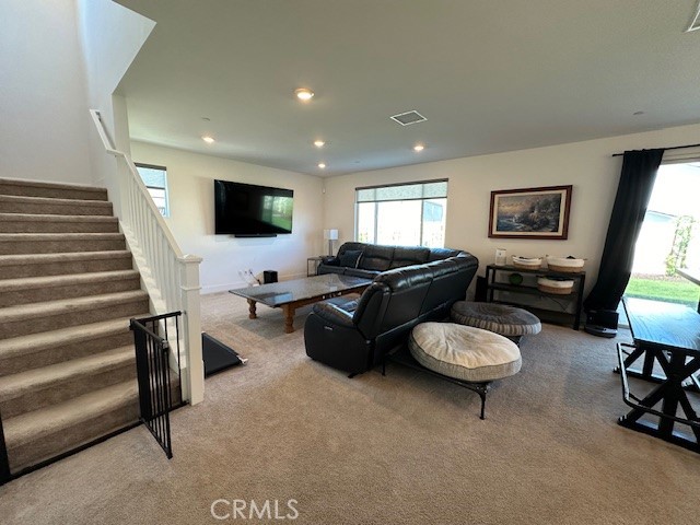 34294 Coconut Circle Winchester, CA 92596 - Photo 6 of 17 a living room with furniture and a flat screen tv
