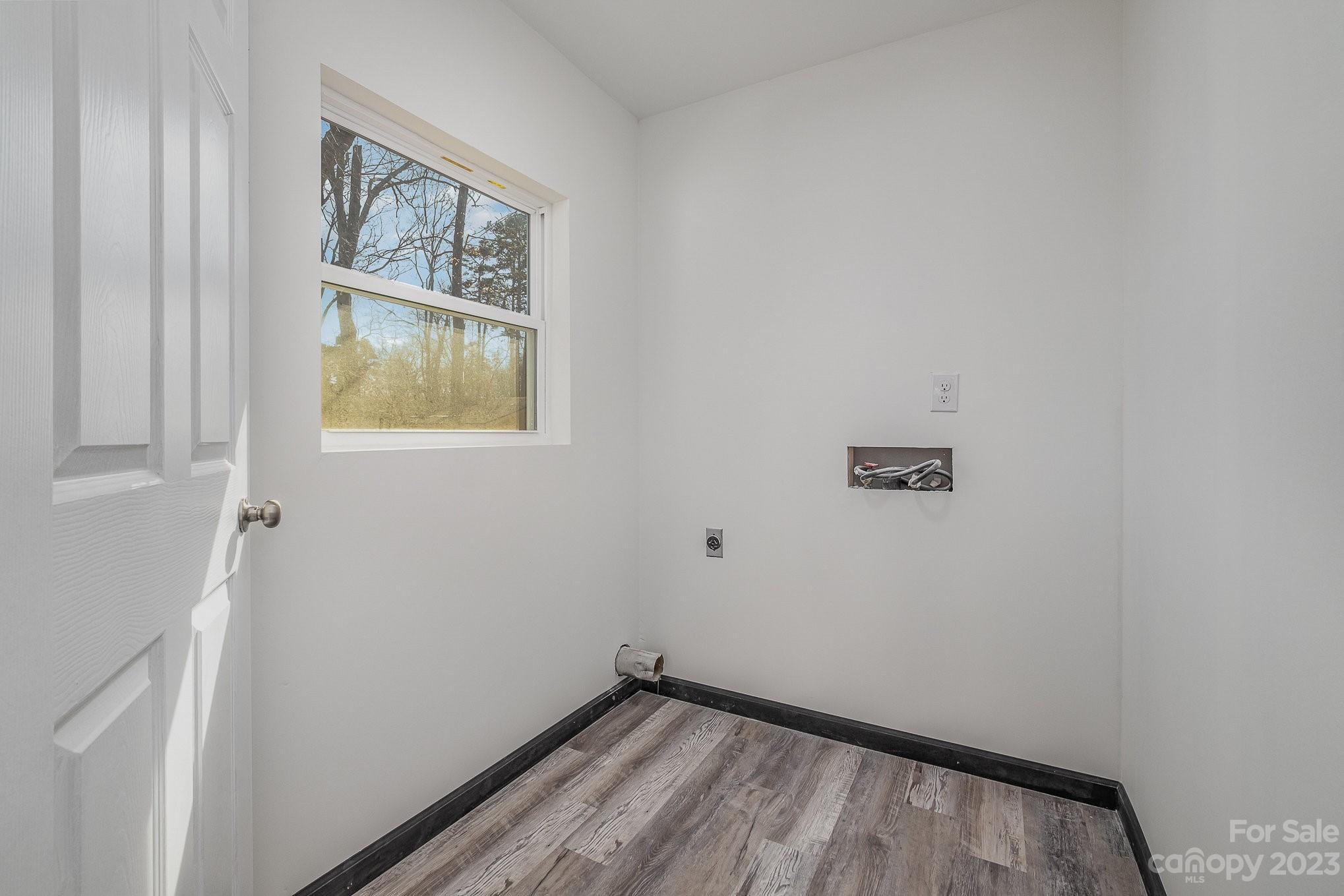 6922 Pear Tree Road Charlotte, NC 28216 - Photo 22 of 26 a view of small space with wooden floor