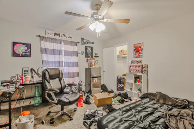 a view of a workspace with furniture and toys
