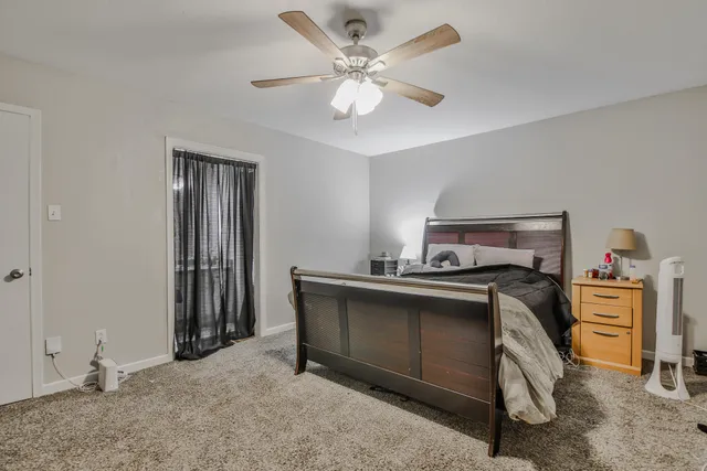 a view of bedroom with furniture
