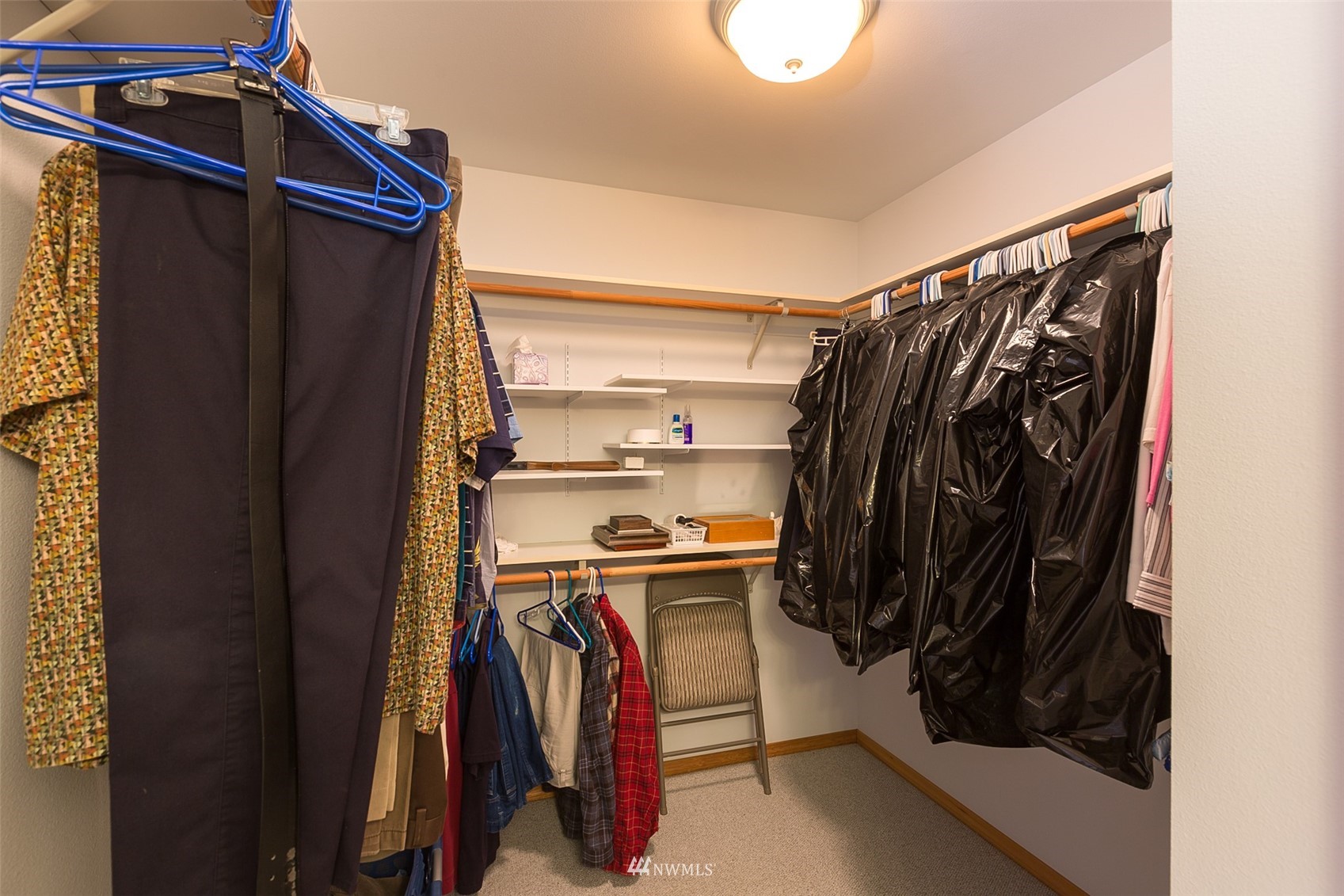 601 East Anderson Road Sequim, WA 98382 - Photo 29 of 37 a view of walk in closet with clothes and shoes