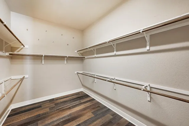 a view of a room with racks on the wall