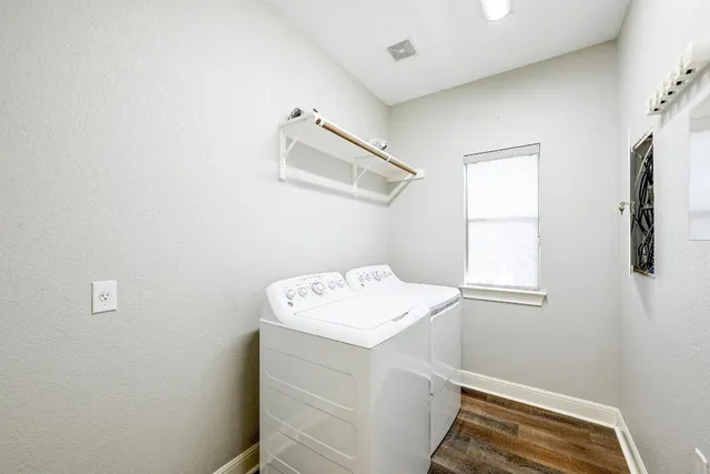 a utility room with dryer and washer