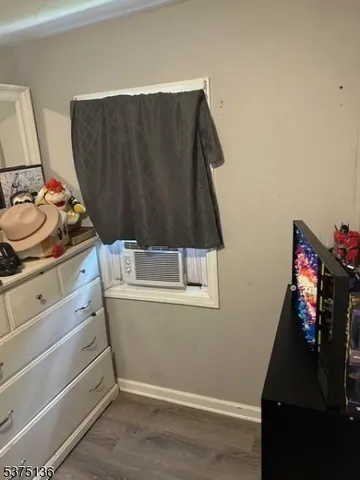 a living room with furniture and window