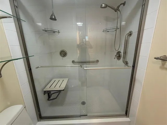 a view of a lake with a yard