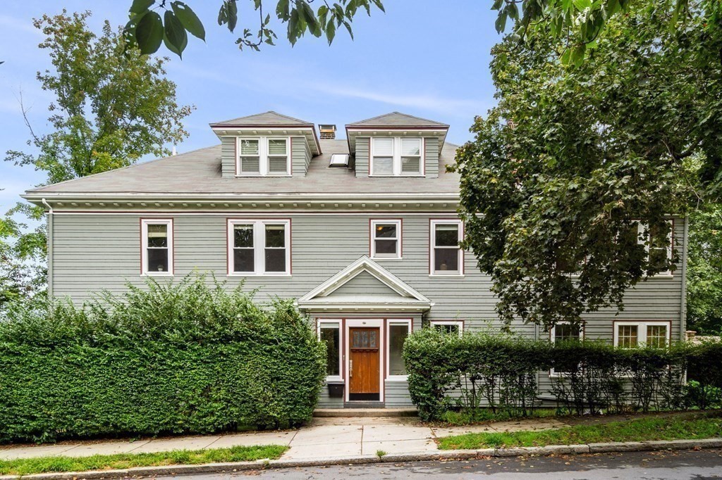 46 Gardner Road, Unit 2 Brookline, MA 02445 - Photo 1 of 38 front view of a house with a yard