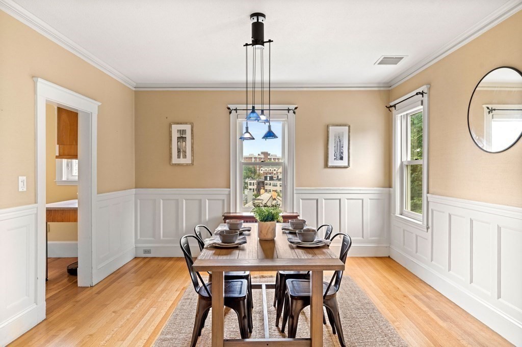46 Gardner Road, Unit 2 Brookline, MA 02445 - Photo 11 of 38 a view of a dining room with furniture window and wooden floor
