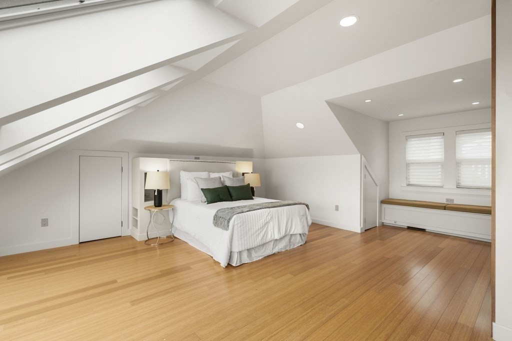 46 Gardner Road, Unit 2 Brookline, MA 02445 - Photo 28 of 38 a spacious bedroom with a bed and a large window