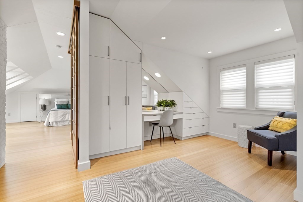 46 Gardner Road, Unit 2 Brookline, MA 02445 - Photo 31 of 38 a living room with furniture and a table