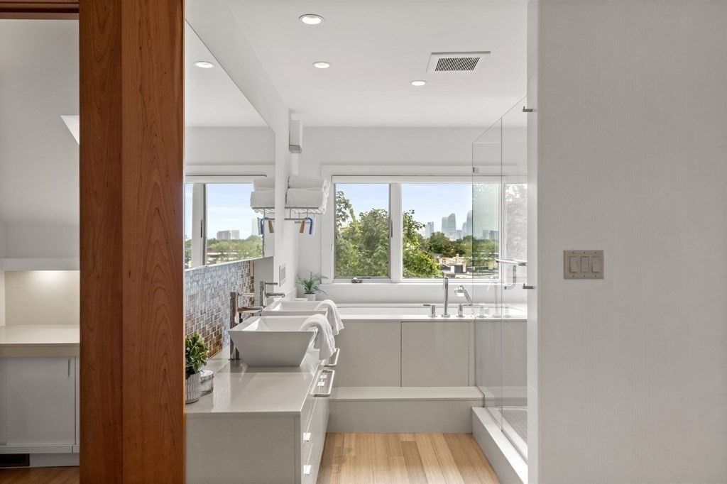 46 Gardner Road, Unit 2 Brookline, MA 02445 - Photo 36 of 38 a bathroom with a bathtub and a sink