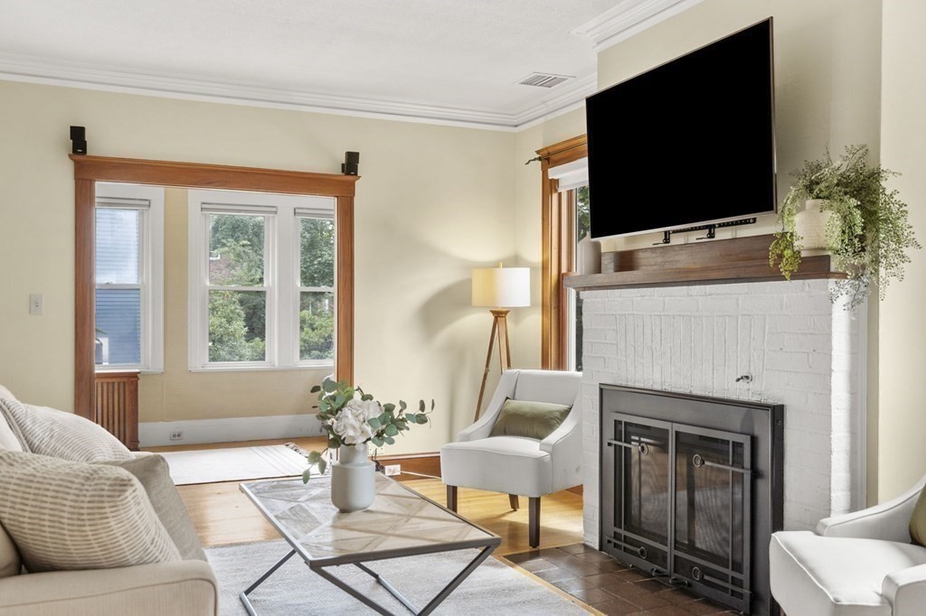 46 Gardner Road, Unit 2 Brookline, MA 02445 - Photo 5 of 38 a living room with furniture and a flat screen tv