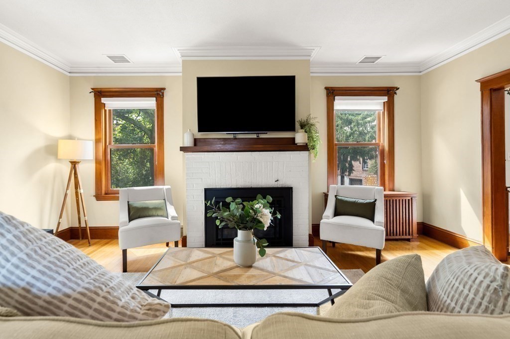 46 Gardner Road, Unit 2 Brookline, MA 02445 - Photo 6 of 38 a living room with furniture fireplace and flat screen tv