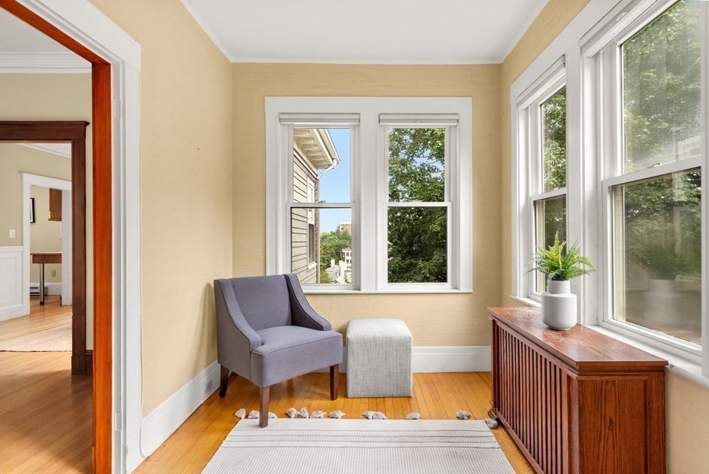 46 Gardner Road, Unit 2 Brookline, MA 02445 - Photo 7 of 38 a living room with furniture and a large window