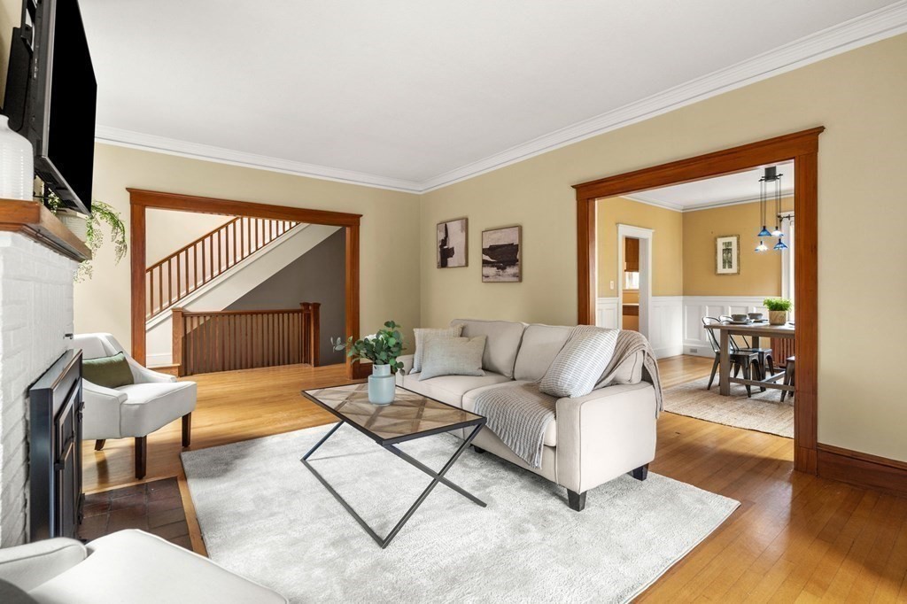 46 Gardner Road, Unit 2 Brookline, MA 02445 - Photo 9 of 38 a living room with furniture and a fireplace