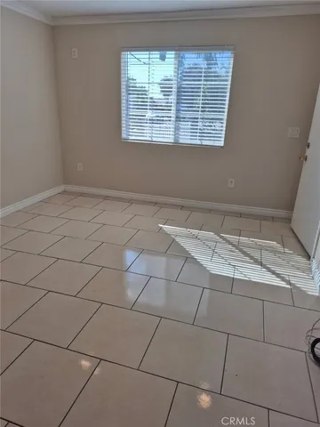 a view of a room that has a window in it