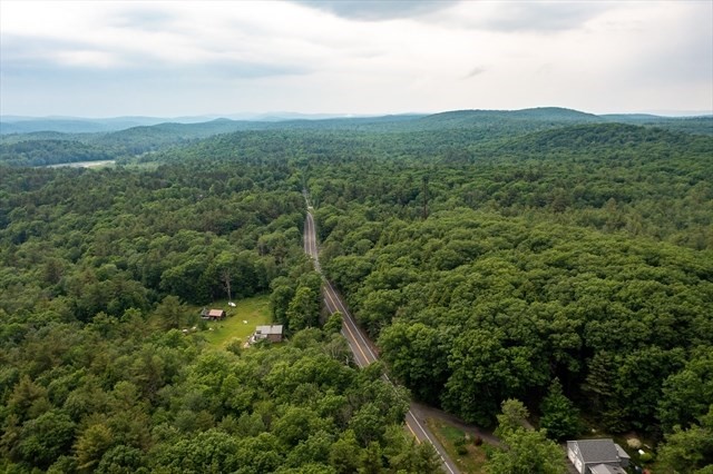 0 East Otis Road Otis, MA 01253 - Photo 2 of 5 a view of a green field with lots of trees in it