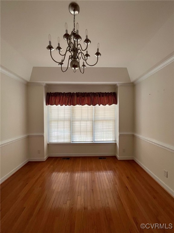 11904 Markey Circle Midlothian, VA 23112 - Photo 7 of 24 an empty room with wooden floor fan and windows