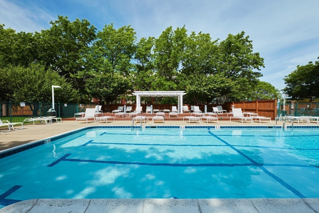 42 8th Street, Unit 1315 Boston, MA 02129 - Photo 15 of 20 a view of a swimming pool with a patio