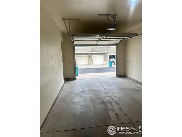 a view of hallway with granite countertop