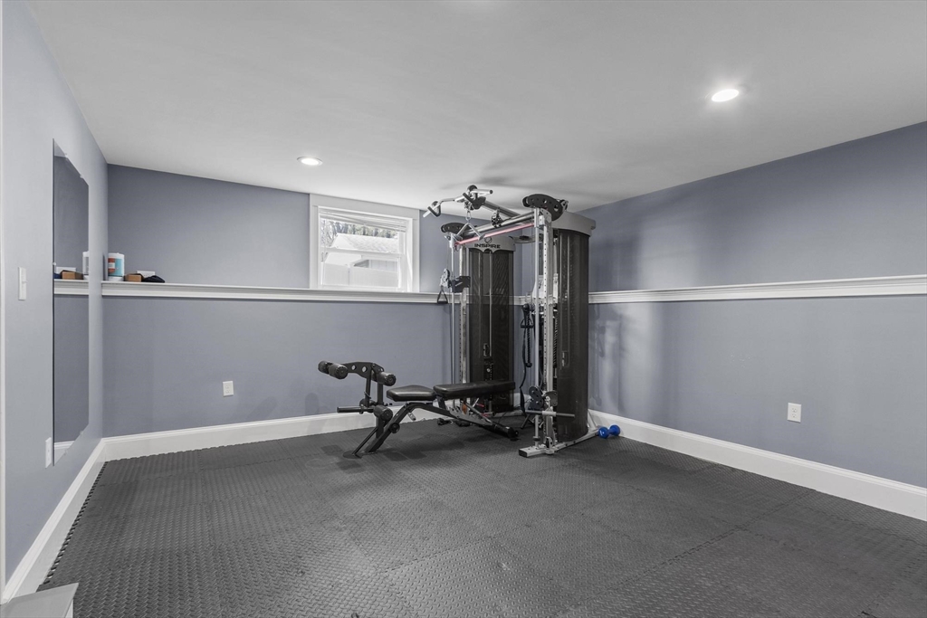 97 Hartwell Road Bedford, MA 01730 - Photo 18 of 42 a view of a room with gym equipment