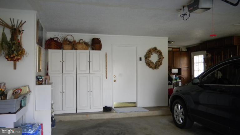 15029 Butterchurn Lane Silver Spring, MD 20905 - Photo 27 of 30 LARGE 2 CAR GARAGE W/ STORAGE AREAS
