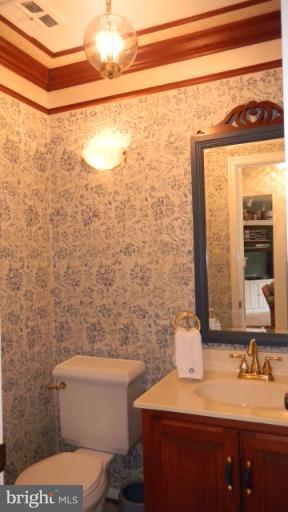 15029 Butterchurn Lane Silver Spring, MD 20905 - Photo 4 of 30 MAIN LEVEL HALF BATH WITH CUSTOM TRAY CEILING