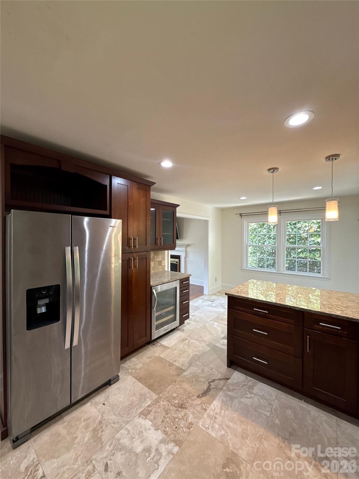 3927 Sharon View Road Charlotte, NC 28226 - Photo 7 of 14 a kitchen with stainless steel appliances a refrigerator and a sink
