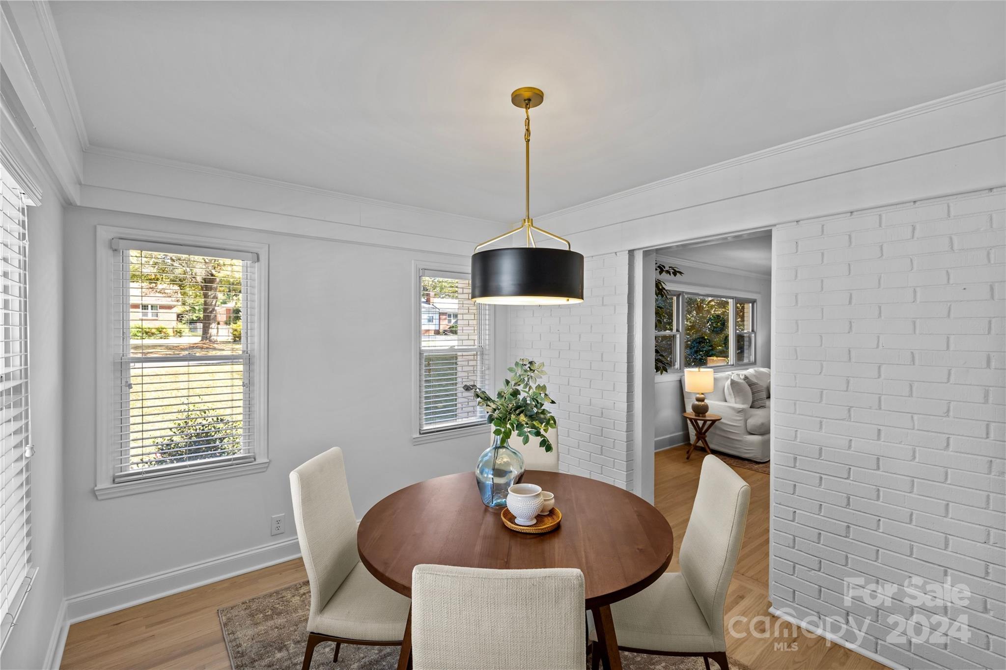 1639 Merry Oaks Road Charlotte, NC 28205 - Photo 12 of 47 a dining room with furniture and window