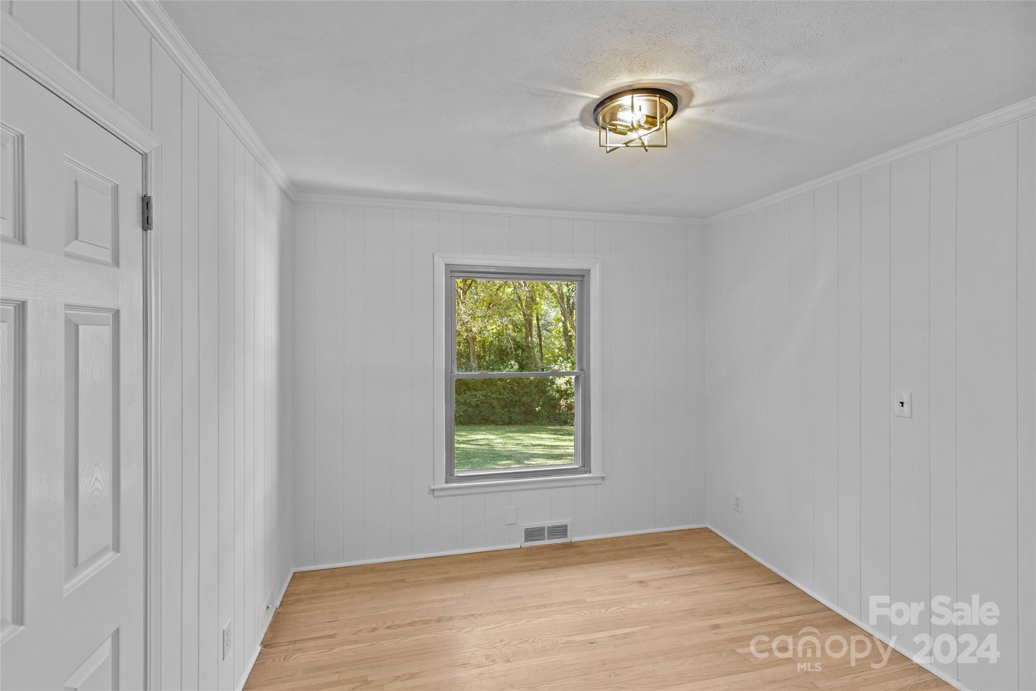 1639 Merry Oaks Road Charlotte, NC 28205 - Photo 21 of 47 a view of an empty room with a window