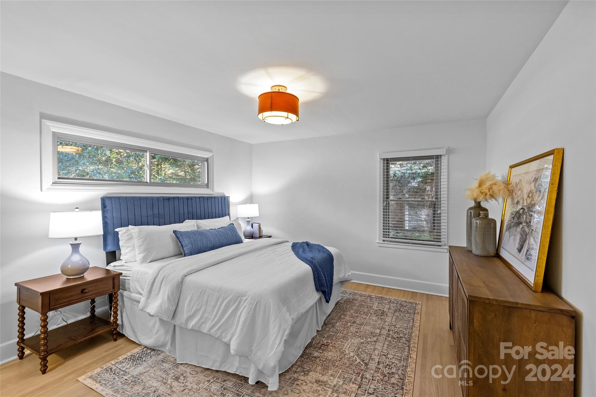 1639 Merry Oaks Road Charlotte, NC 28205 - Photo 29 of 47 a bedroom with a bed and a couch