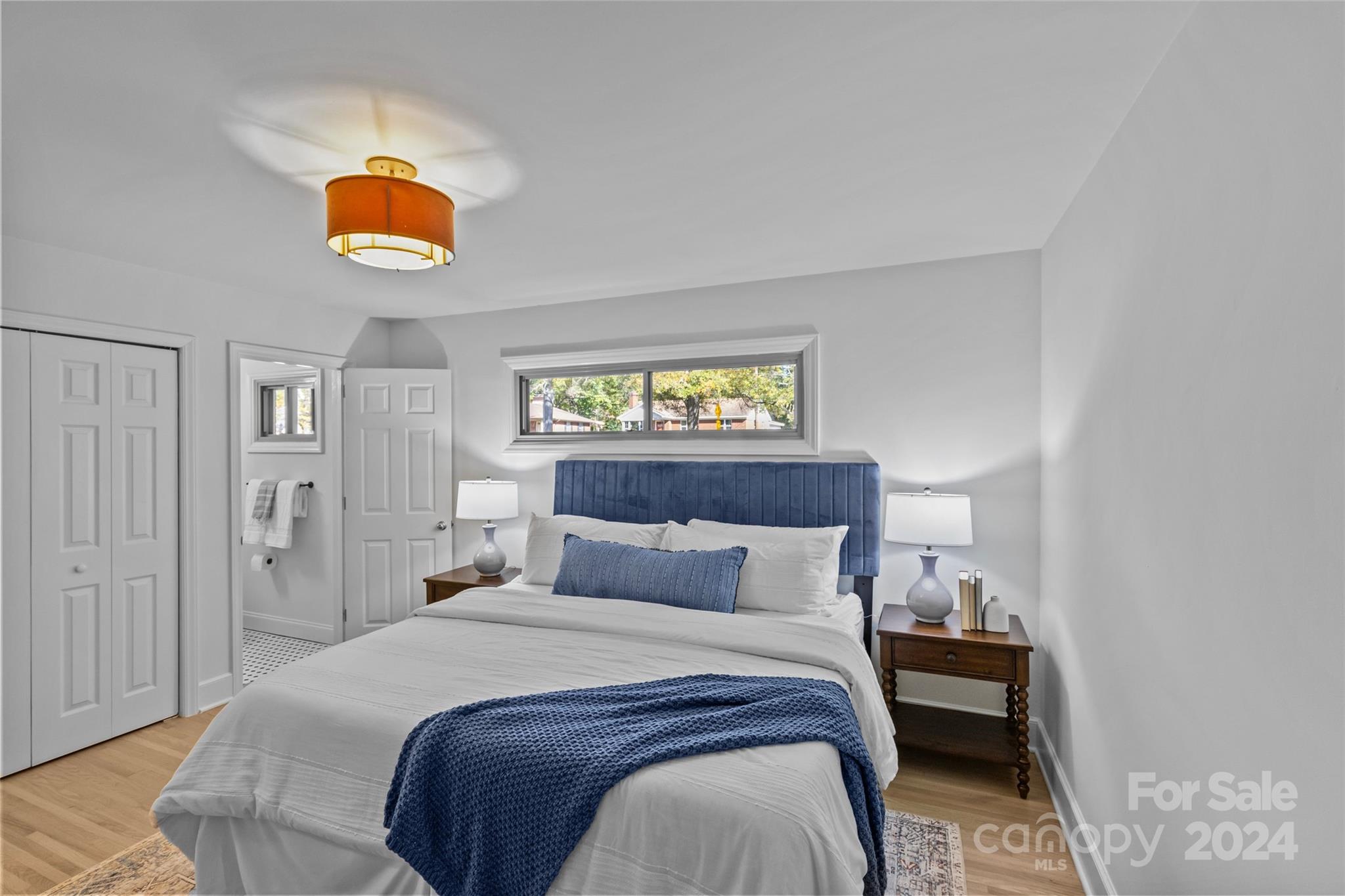 1639 Merry Oaks Road Charlotte, NC 28205 - Photo 30 of 47 a bedroom with a bed and a window
