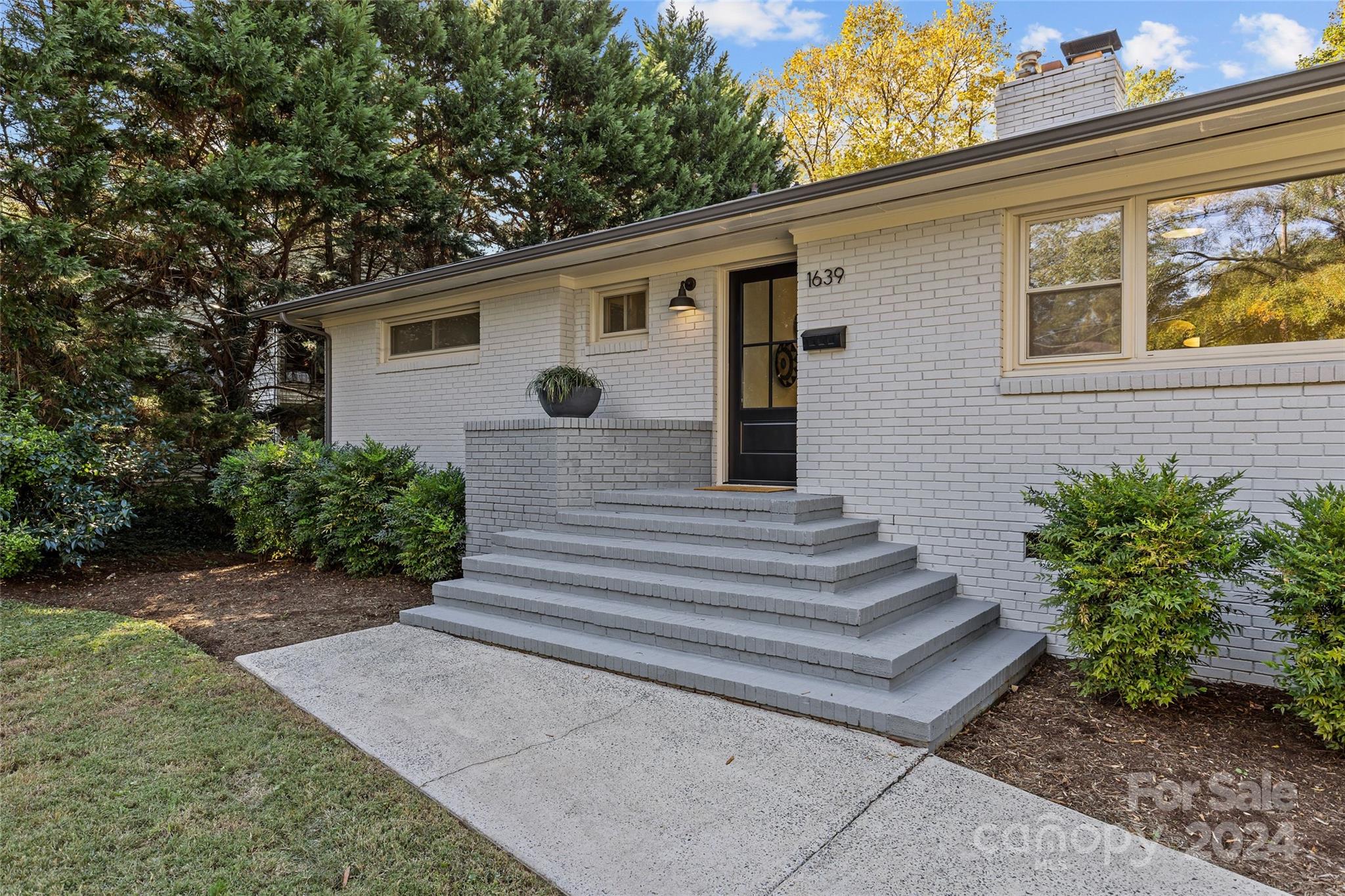 1639 Merry Oaks Road Charlotte, NC 28205 - Photo 3 of 47 a view of a house with a yard